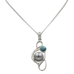 Large Pearl Swirly Pendant with an accent gemstone