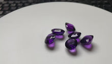 Load and play video in Gallery viewer, Natural Ceylon Amethysts of varying sizes and shapes
