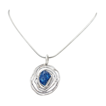 Load image into Gallery viewer, A beautiful rough Neon Apatite pendant accent with an elegantly handcrafted sterling silver spiral base.
