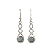 Load image into Gallery viewer, A swirly, unique and elegant pair of sterling silver earrings
