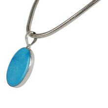 Load image into Gallery viewer, A classic Circle to Oval Shaped Blue Turquoise Set on Sterling Silver Open Back bazel
