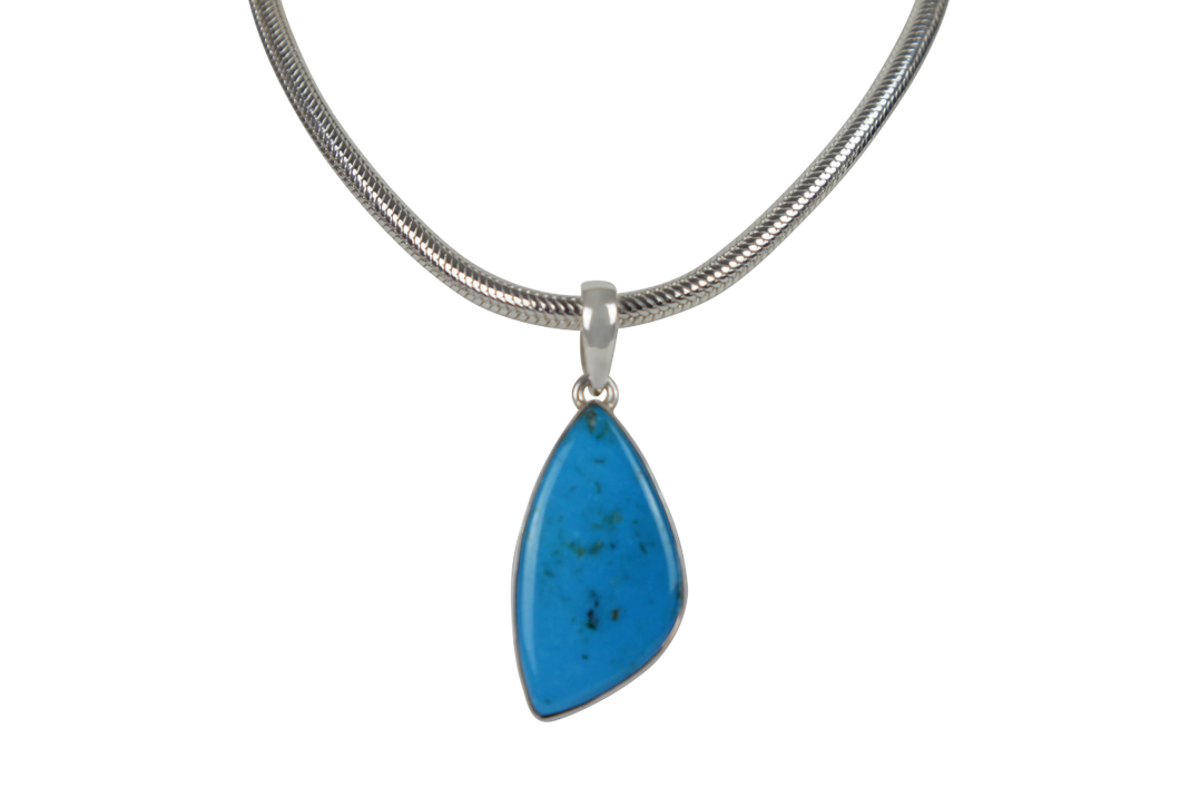 A simple Uncustomary Shape Blue Turquoise Set on Sterling Silver Open Back bazel
