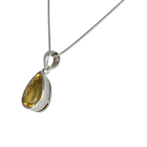 A stunning Solitaire Pear-shaped Mixed-cut Citrine pendant features a flawless Citrine gemstone.