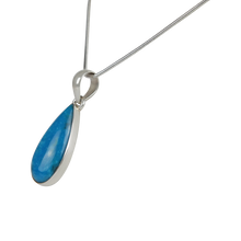 Load image into Gallery viewer, A simple Long Teardrop Shaped Persian Blue Turquoise Set on Sterling Silver Open Back bazel
