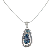 Load image into Gallery viewer, A beautiful rough Neon Apatite pendant accent with a Blue Topaz and elegantly hand set in Sterling Silver bazel.
