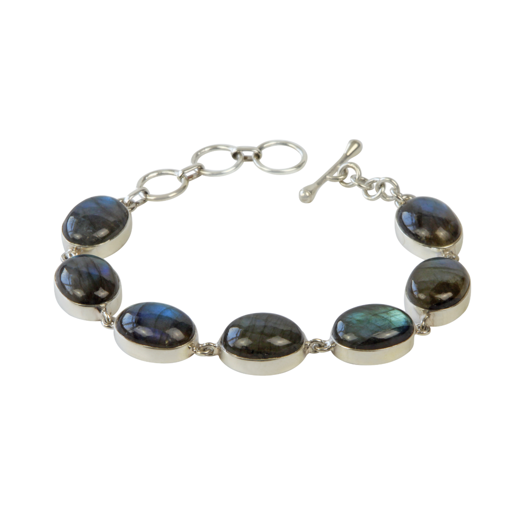 Bracelet with 7 Oval shaped Colourful Labradorite Stones elegantly hand-cast in Sterling Silver