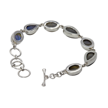 Load image into Gallery viewer, Bracelet with 7 Mixed Shaped Colourful Labradorite Stones elegantly hand-cast in Sterling Silver
