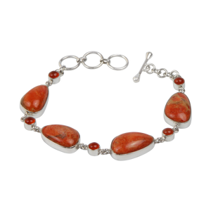 An Elegant Design with 4 Beautiful Sponge Corals set in a Sterling Silver Bracelet and Accented with Small Round Carnalian Gems