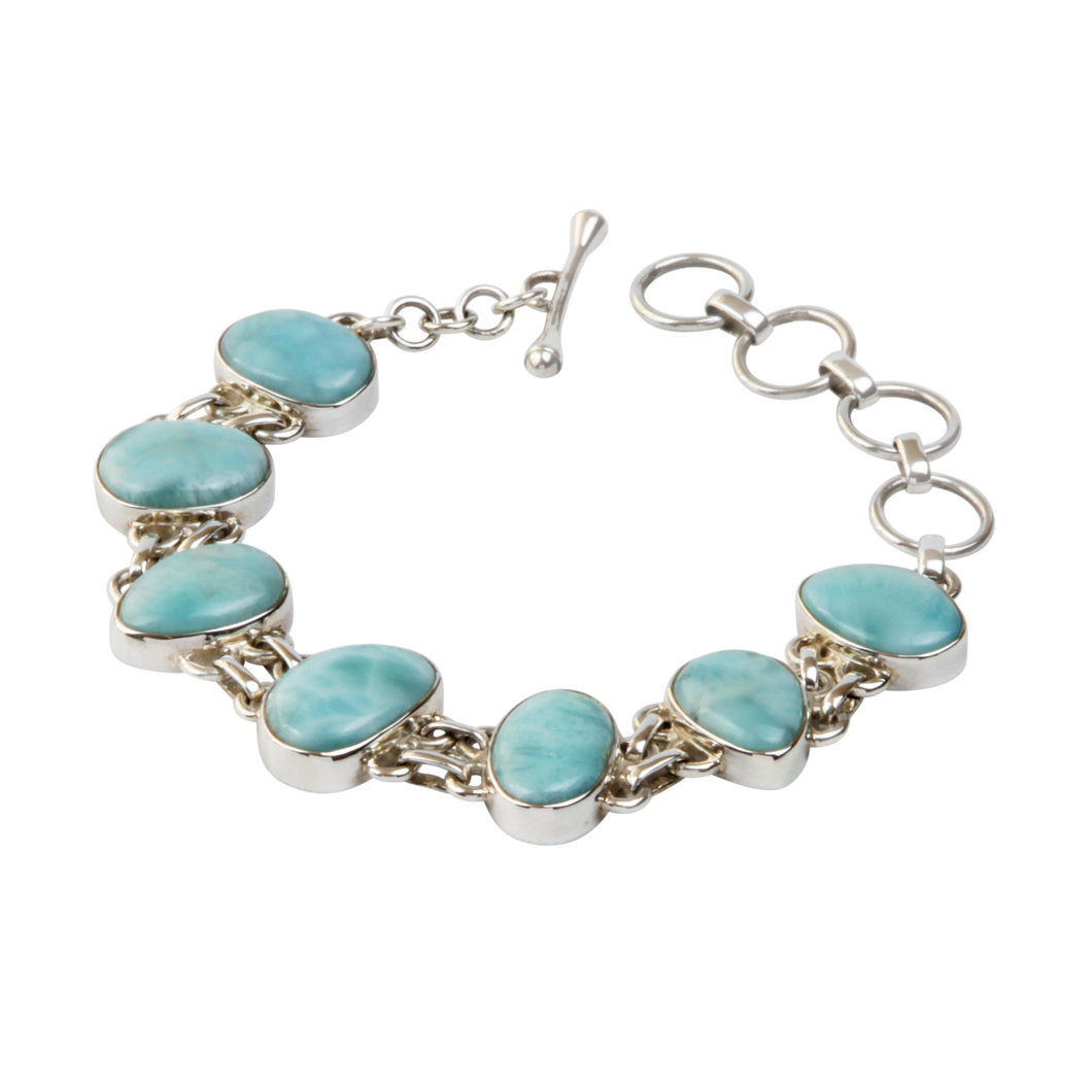 An Exquisite Double Linked Sterling Silver Bracelet with 7 unique shaped Larimar Crystals