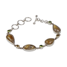 Load image into Gallery viewer, An Elegant Design with 4 Beautiful Goldan Rutiles Set in a Sterling Silver Bracelet and Accented with Small Round Faceted Peridot and Citrine Gems Gems
