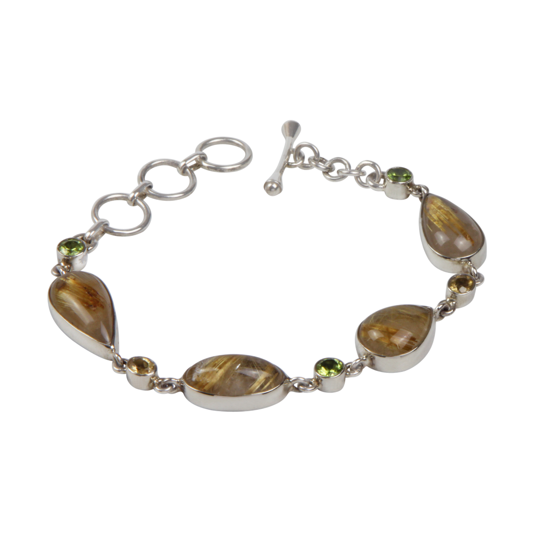 An Elegant Design with 4 Beautiful Goldan Rutiles Set in a Sterling Silver Bracelet and Accented with Small Round Faceted Peridot and Citrine Gems Gems