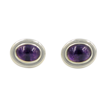 Load image into Gallery viewer, Oval Amethyst gemstone stud earrings with a sterling silver surround
