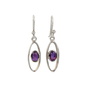 Elegant oval drop sterling silver earrings holding an amethyst