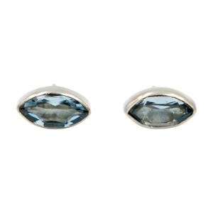 Pointed Oval Silver Stud Earring with a faceted Blue Topaz gemstone on a deep bezel setting