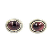 Load image into Gallery viewer, Oval Garnet gemstone stud earrings with a sterling silver surround
