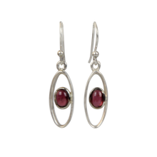 Load image into Gallery viewer, Elegant oval drop sterling silver earrings holding a garnet
