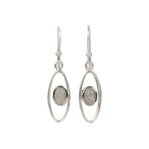 Elegant oval drop sterling silver earrings holding a moonstone