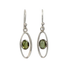 Load image into Gallery viewer, Elegant oval drop sterling silver earrings holding a peridot
