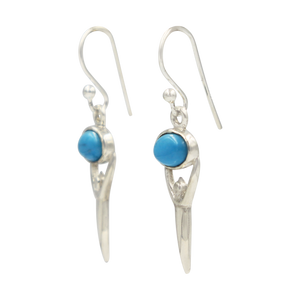 Beautifully handcrafted sterling silver drop earring accent with a cabochon Turquoise 