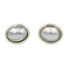 Load image into Gallery viewer, Oval Freshwater Pearl gemstone stud earrings with a sterling silver surround
