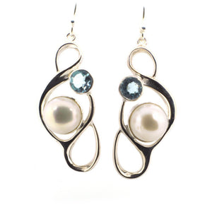 Large Pearl Swirly Earring with an accent gemstone