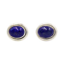 Load image into Gallery viewer, Oval Lapis Lazuli gemstone stud earrings with a sterling silver surround
