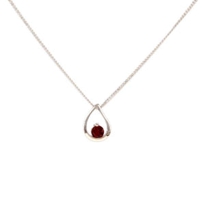 Teardrop sterling silver necklace with a faceted Garnet Red  Cubic Zirconia 