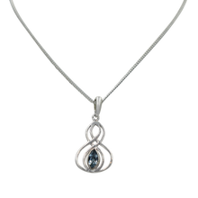 Load image into Gallery viewer, Double Infinity Pendant with a faceted Blue Topaz
