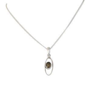 Stylish long oval pendant with a similarly oval shaped gemstone