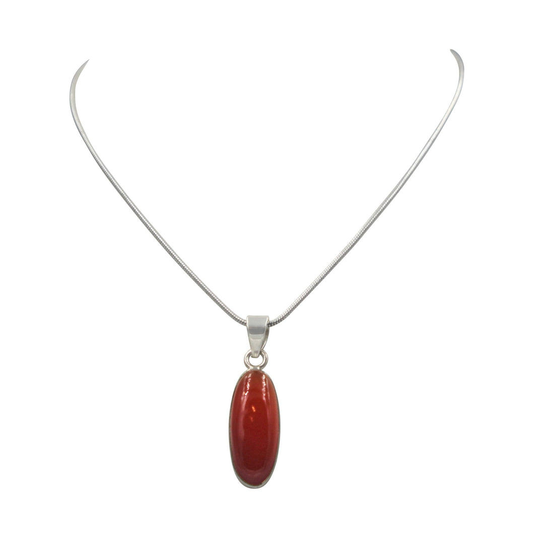 Handcrafted long oval shaped cabochon Carnelian pendant presented on 18