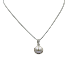 Load image into Gallery viewer, Sterling Silver simple Round pendant with a half sphere Fresh Water Pearl
