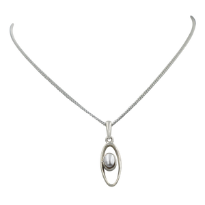 Stylish long oval pendant with a similarly oval shaped Pearl
