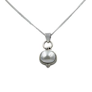 Oval Shaped simple but elegant pendant with a cabochon Pearl