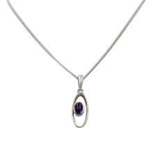Load image into Gallery viewer, Stylish long oval pendant with a similarly oval shaped Amethyst 
