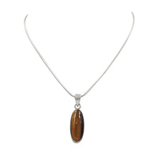 Load image into Gallery viewer, Handcrafted long oval shaped cabochon Tiger&#39;s Eye pendant presented on 18&quot; Sterling Silver Chain
