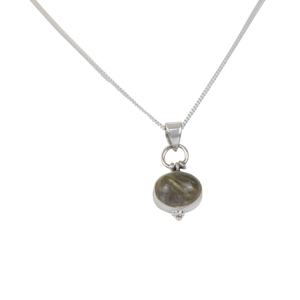 Oval Shaped simple but elegant pendant with a cabochon stone