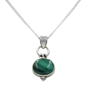 Oval Shaped simple but elegant pendant with a cabochon Malachite stone