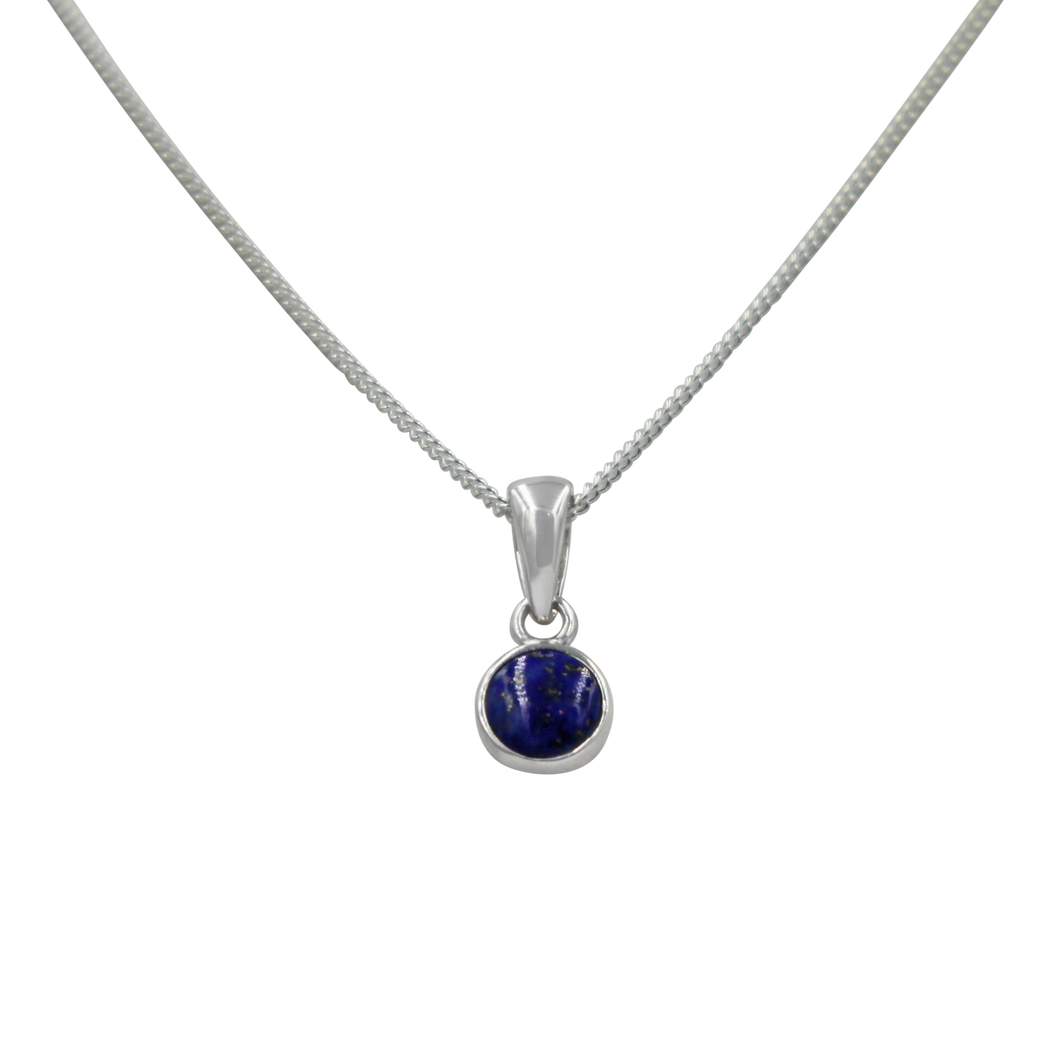 A simple round Lapis Lazuli pendant presented on a sterling Silver chain