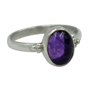 A simple and slightly ethnic ring with a large oval cabochon stone which can be used for everyday wearing