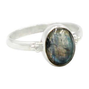 A simple and slightly ethnic ring with a large oval Dark Labradorite which can be used for everyday wearing