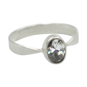 A very delicate ring in sterling silver with a small faceted oval Cubic Zirconia stone.
